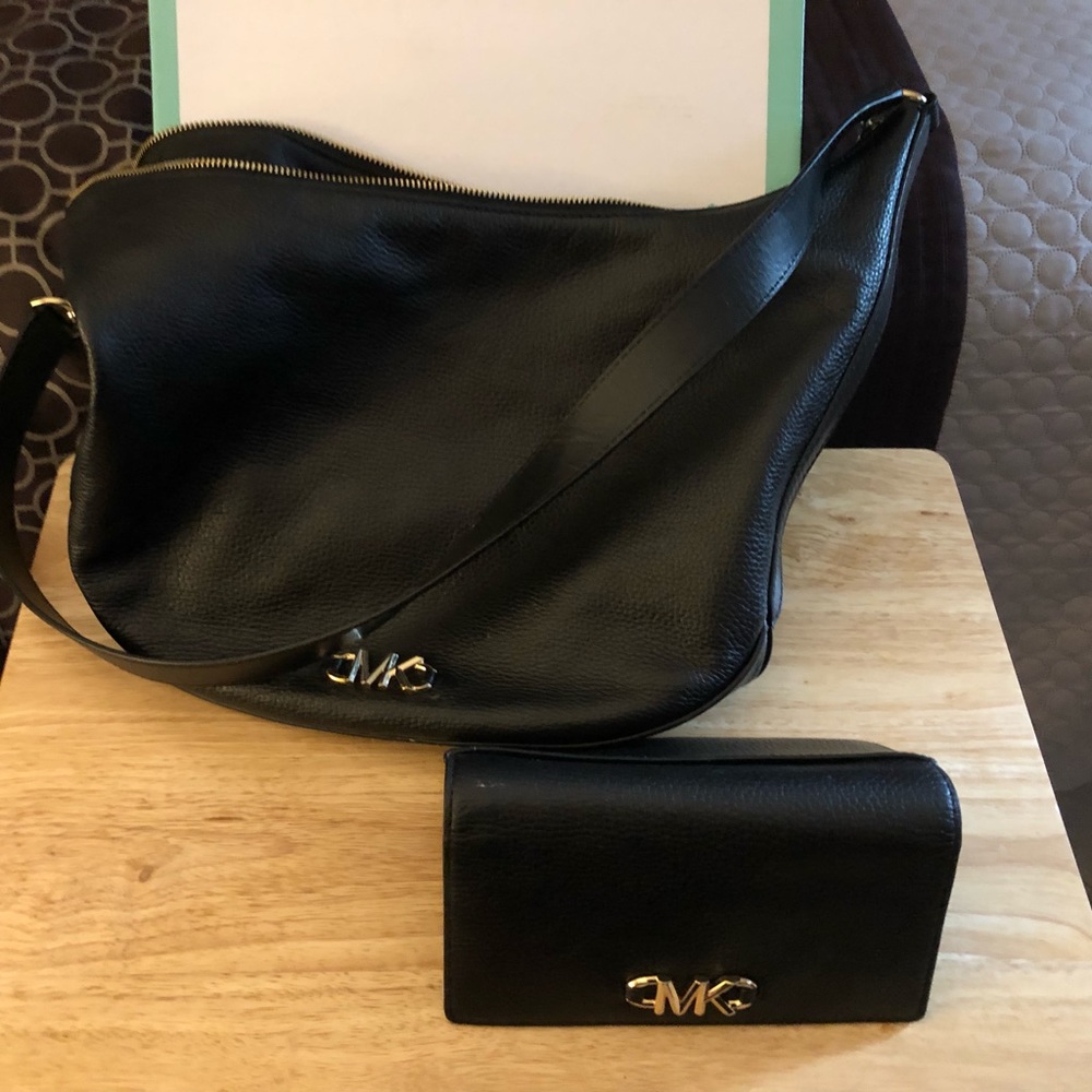 Michael Kors gently used purse and wallet.